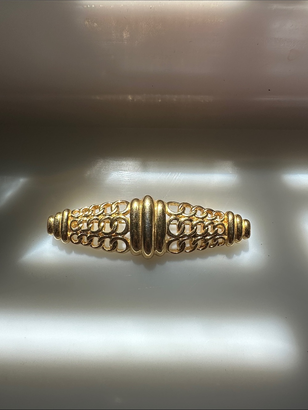 Trifari gold tone brooch